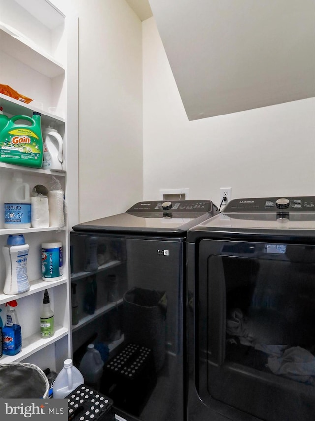 washroom featuring separate washer and dryer