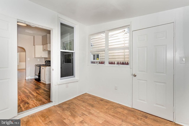 212 W Allen St, Mechanicsburg, PA 17055 - interior space with arched walkways and light wood-type flooring