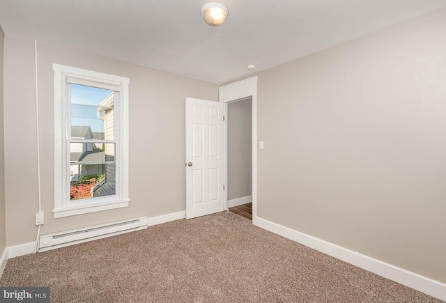 212 W Allen St, Mechanicsburg, PA 17055 - carpeted spare room featuring a baseboard radiator and baseboards