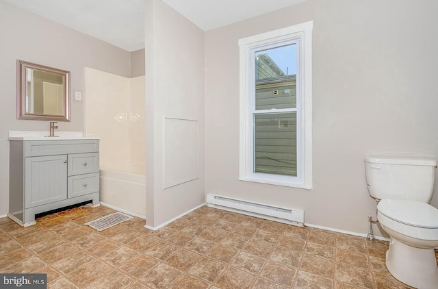 212 W Allen St, Mechanicsburg, PA 17055 - full bathroom featuring toilet, a baseboard heating unit, vanity, visible vents, and baseboards