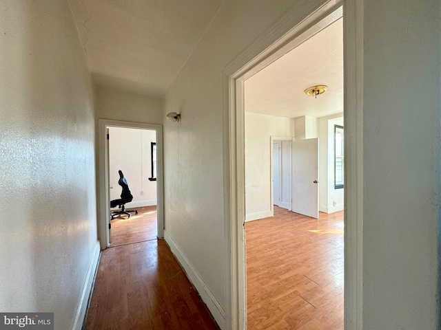 hallway featuring light hardwood / wood-style flooring