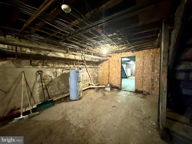 basement featuring electric water heater