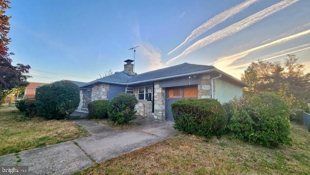 ranch-style house with a yard