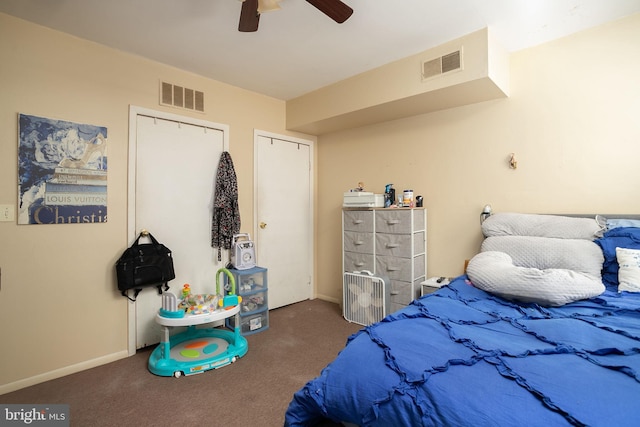 carpeted bedroom with a closet and ceiling fan