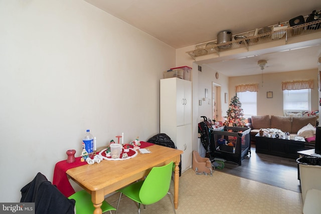 dining room featuring visible vents