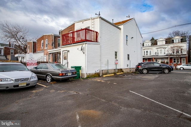 exterior space with uncovered parking