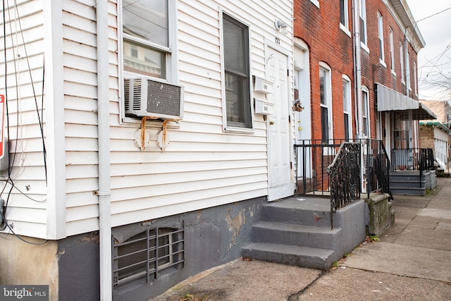 view of home's exterior featuring cooling unit