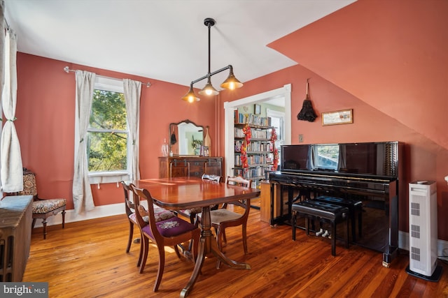 dining space featuring hardwood / wood-style flooring