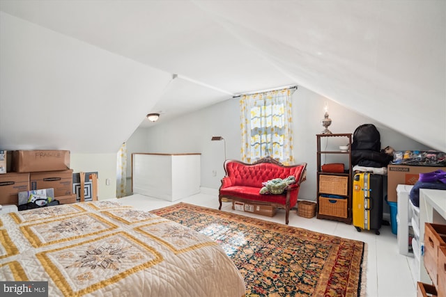 bedroom featuring vaulted ceiling