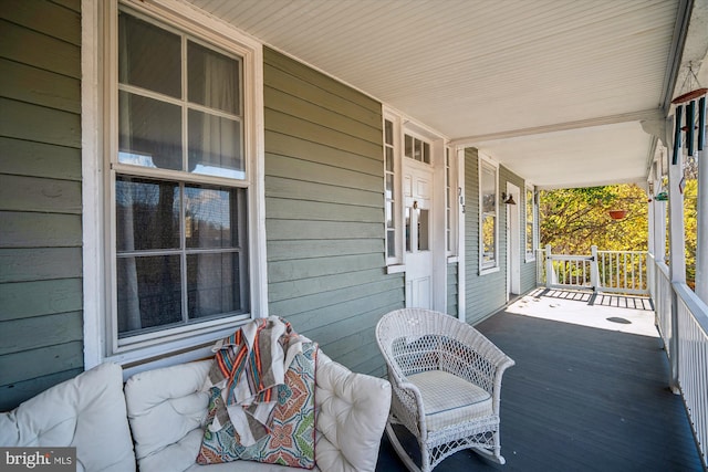 deck featuring covered porch