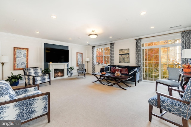 living room with carpet floors and crown molding