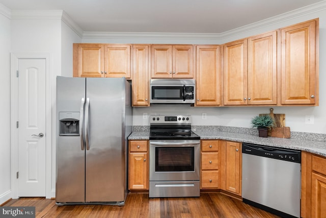 kitchen with light stone countertops, dark hardwood / wood-style flooring, crown molding, and appliances with stainless steel finishes