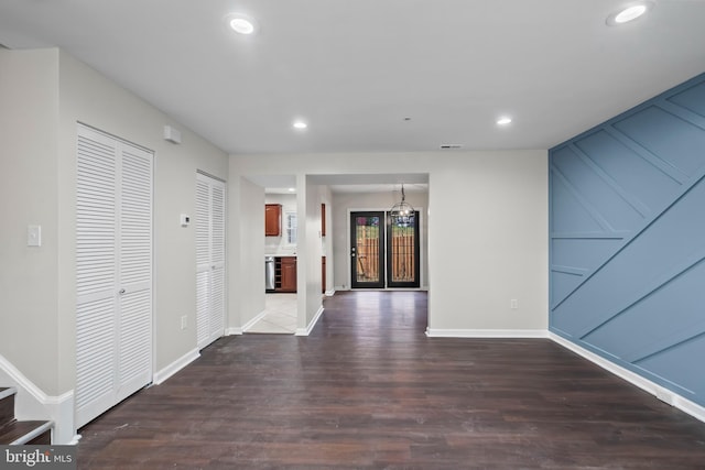 hall with dark hardwood / wood-style flooring