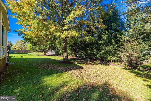 view of yard with fence