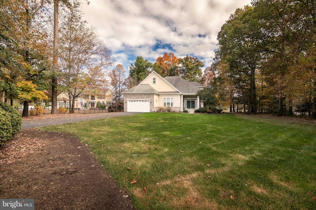 view of front facade with a front lawn and a garage