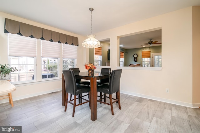 dining area featuring ceiling fan