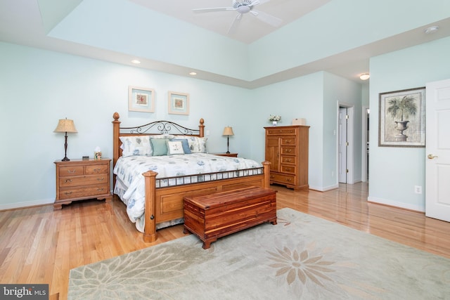 bedroom featuring light hardwood / wood-style floors and ceiling fan