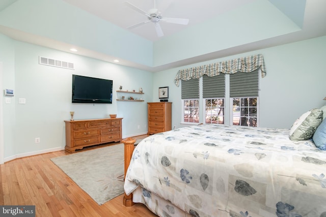 bedroom featuring light hardwood / wood-style floors and ceiling fan