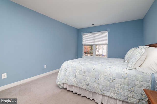 bedroom featuring carpet flooring