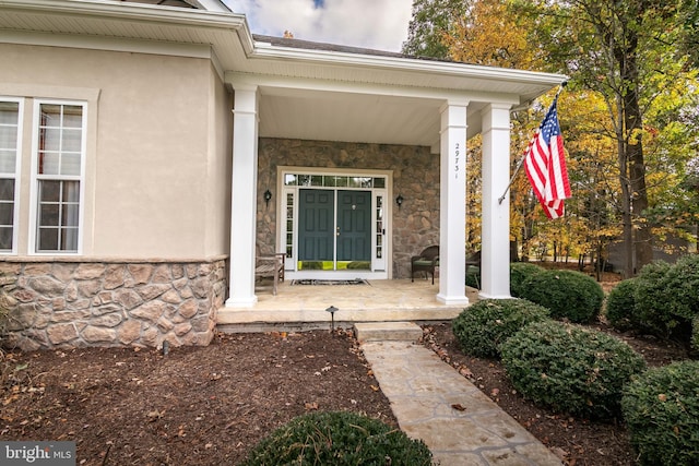 entrance to property with a porch