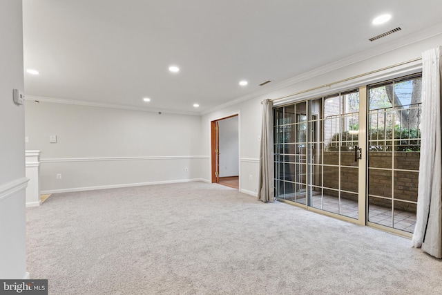 carpeted empty room with ornamental molding