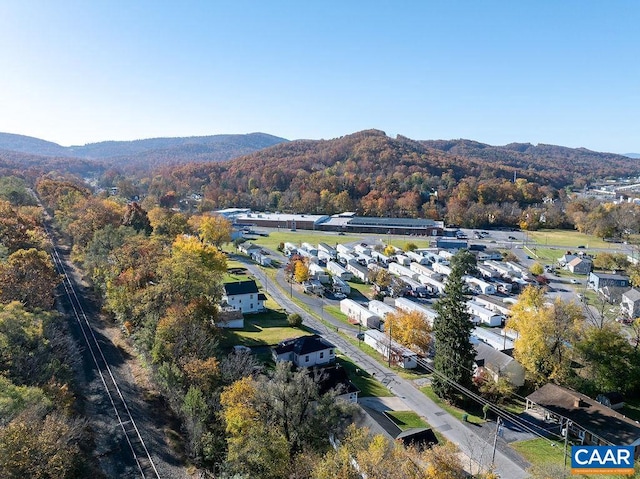 drone / aerial view featuring a mountain view