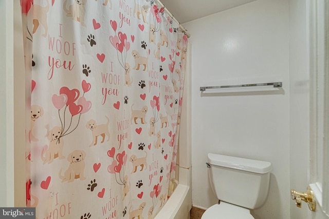 bathroom featuring toilet and shower / bathtub combination with curtain