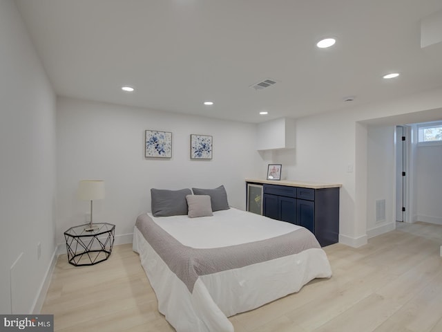 bedroom with light wood-type flooring