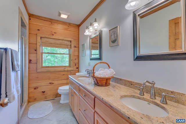 bathroom with toilet, wood walls, ornamental molding, vanity, and an enclosed shower