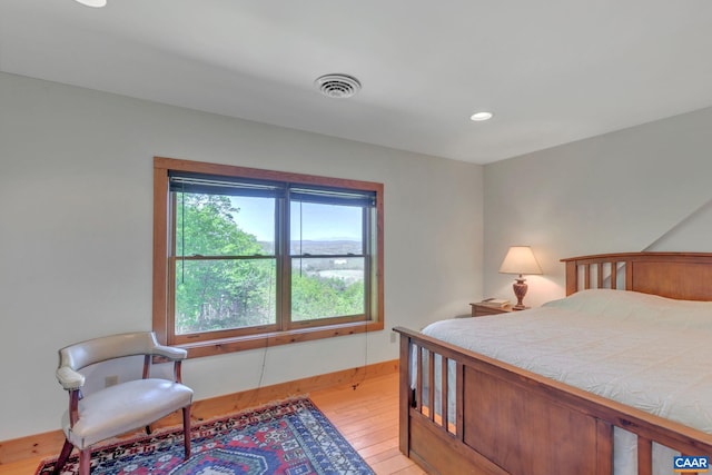 bedroom featuring light wood-type flooring