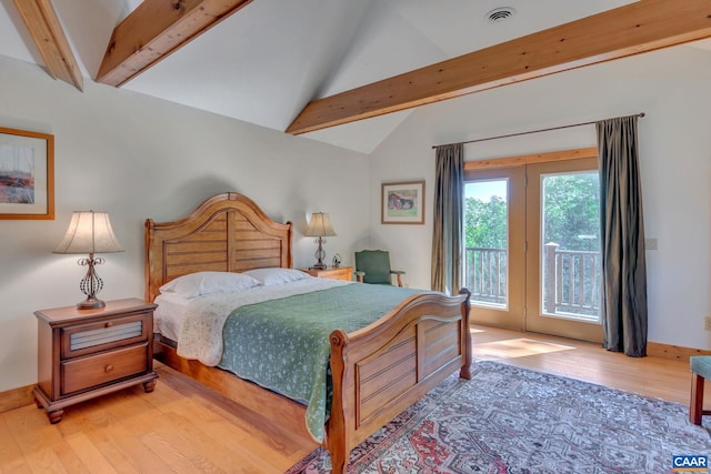 bedroom with french doors, light hardwood / wood-style floors, lofted ceiling with beams, and access to exterior