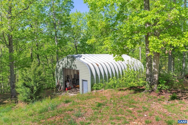 view of outdoor structure featuring a garage