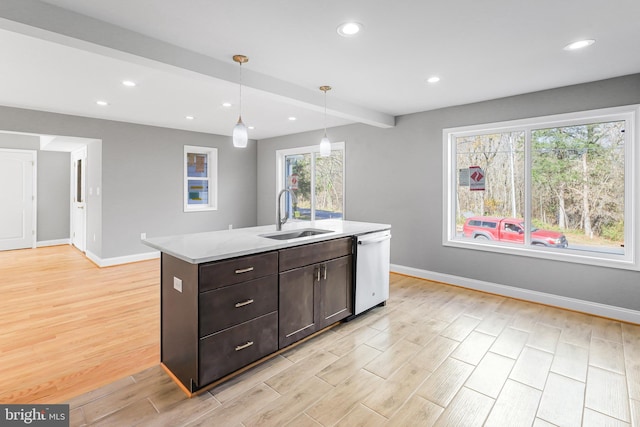 kitchen with sink, dark brown cabinets, hanging light fixtures, dishwasher, and beam ceiling