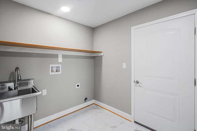 clothes washing area featuring washer hookup, sink, and hookup for an electric dryer