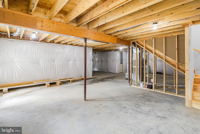 basement featuring electric panel