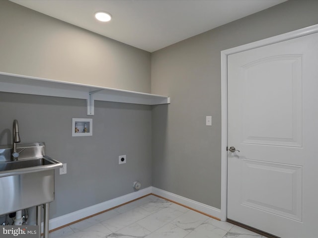 washroom with baseboards, marble finish floor, hookup for a washing machine, laundry area, and electric dryer hookup