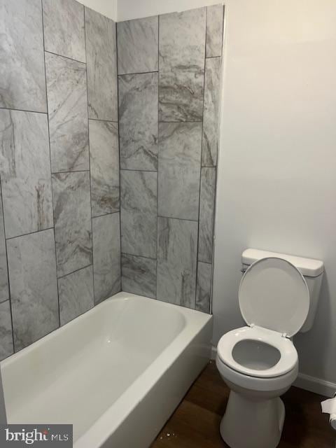 bathroom with toilet and hardwood / wood-style flooring