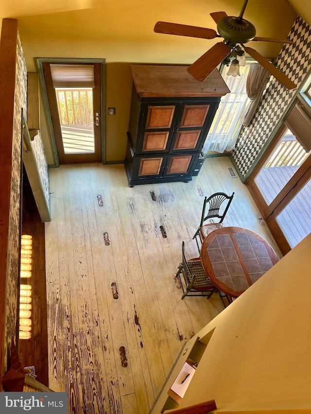 interior space featuring light wood-type flooring and ceiling fan