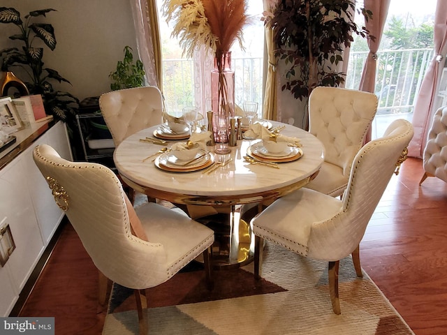 dining area featuring dark hardwood / wood-style flooring