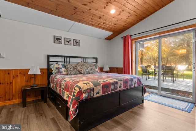 bedroom featuring wooden ceiling, lofted ceiling, access to outside, wooden walls, and hardwood / wood-style flooring