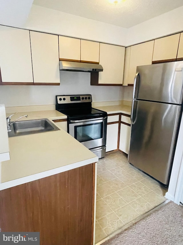 kitchen featuring stainless steel appliances and sink