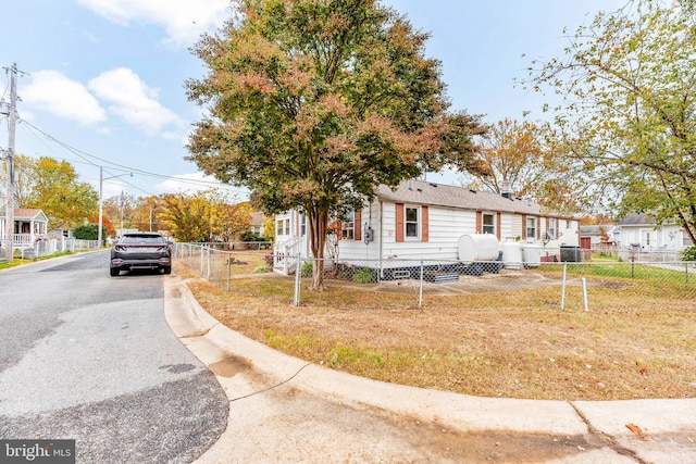 view of front of property featuring central AC unit