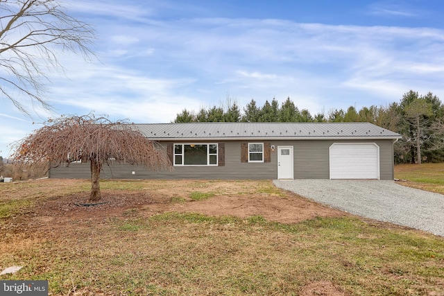 single story home with a garage