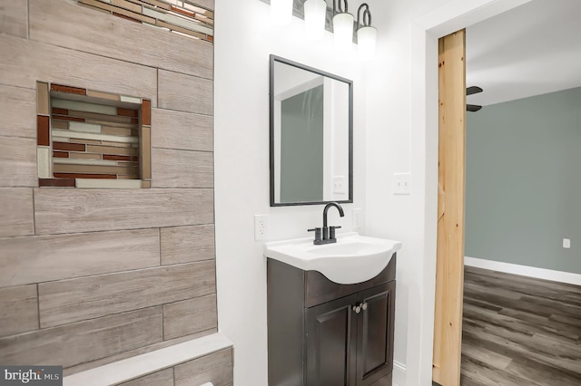 bathroom featuring vanity and wood-type flooring