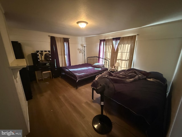 bedroom featuring hardwood / wood-style floors