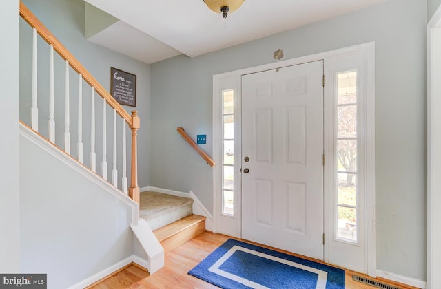 entryway featuring wood-type flooring