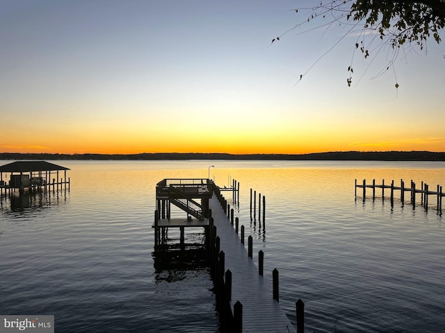 dock area featuring a water view