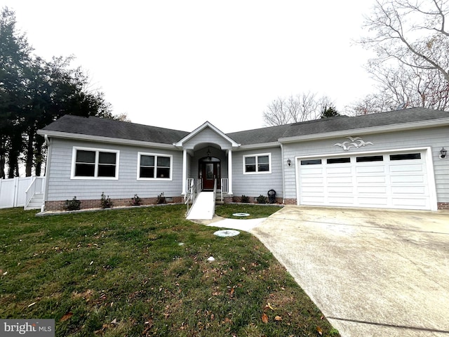 ranch-style house with a garage and a front yard