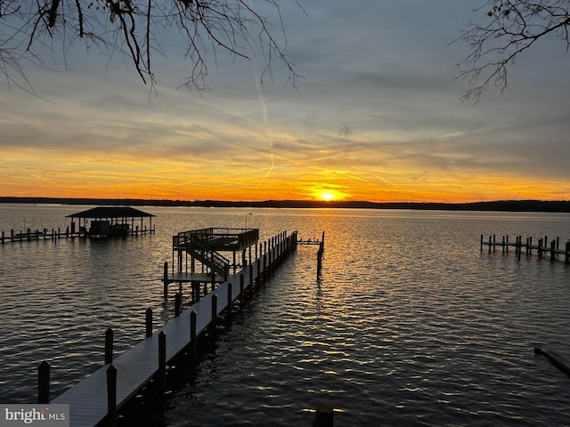 view of dock with a water view