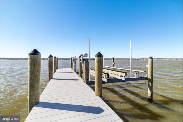 view of dock with a water view